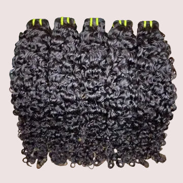 Extensiones 100% humanas rizadas